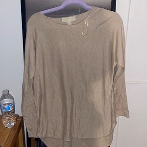 Beige Micheal kors sweater no stains  wrickles just needs to be irons